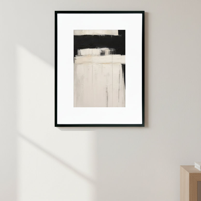Abstract art piece with black, white, and gray tones on a white background