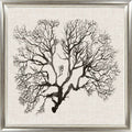 Framed artwork of a black tree silhouette on a textured white background