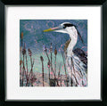 Framed artwork of a heron among reeds with a colorful abstract background