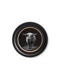 Black and white highland cow in a round black frame on a white background